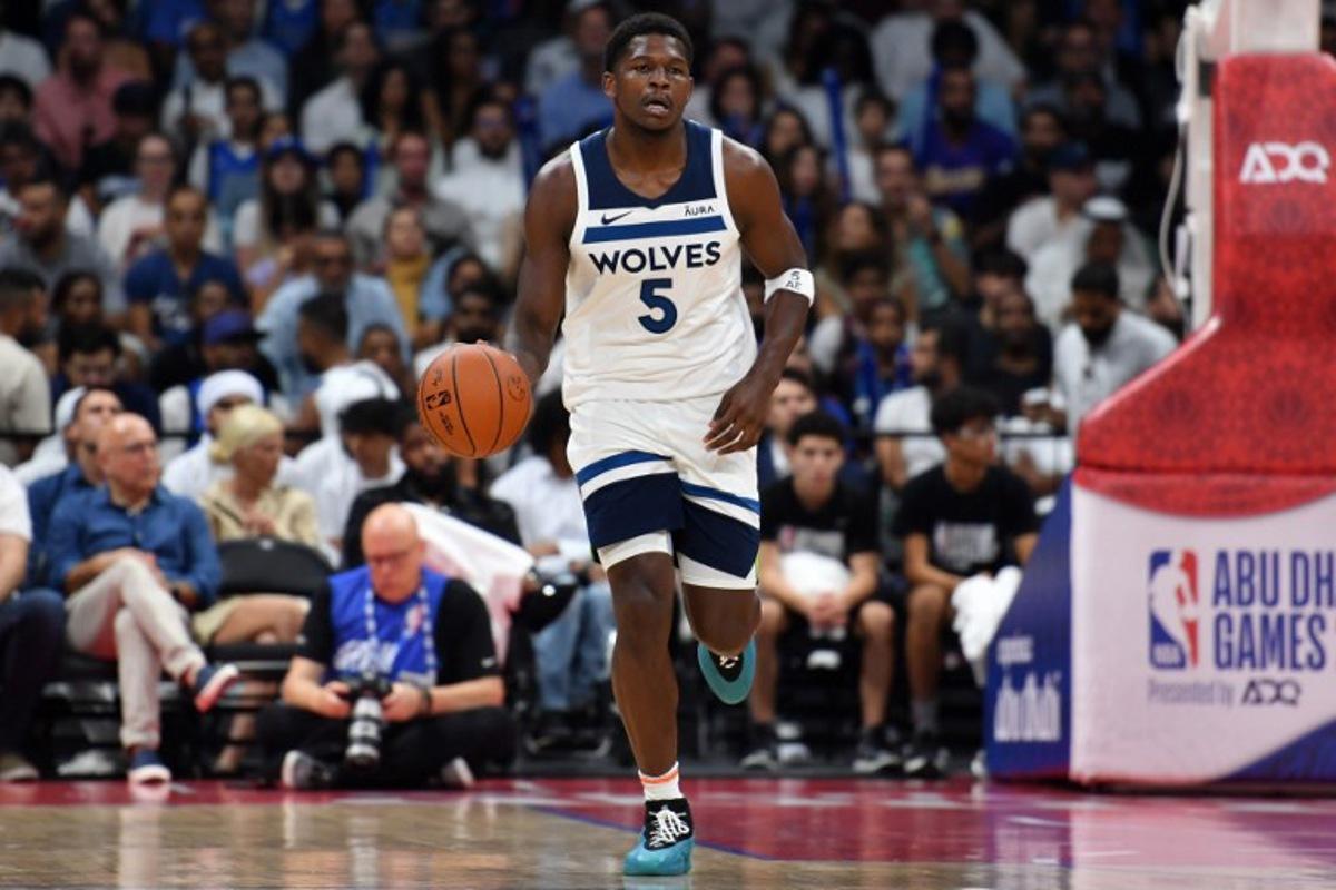 Minnesota Timberwolves' guard Anthony Edwards #5 dribbles the ball during the NBA Preseason game between the Dallas Mavericks and the Minnesota Timberwolves at the Etihad Arena in Abu Dhabi on October 7, 2023. Ryan LIM / AFP