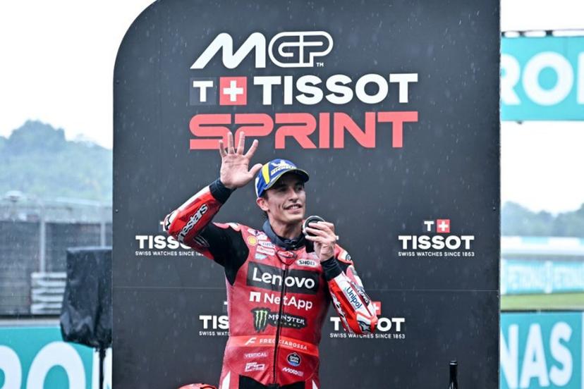 Second place Ducati Lenovo Team's Spanish rider Marc Marquez gestures on the podium of the sprint race of the MotoGP Malaysian Grand Prix at the Sepang International Circuit in Sepang on October 31, 2026. MOHD RASFAN / AFP