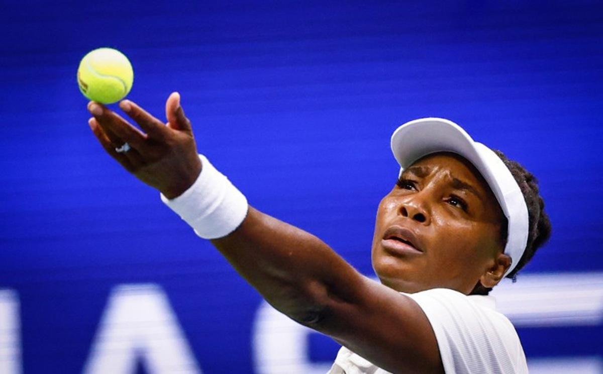 USA's Venus Williams serves the ball to Czech Republic's Karolina Muchova during their women's singles first round tennis match on day two of the US Open tennis tournament at the USTA Billie Jean King National Tennis Center in New York City, on August 25, 2025. Kena Betancur / AFP