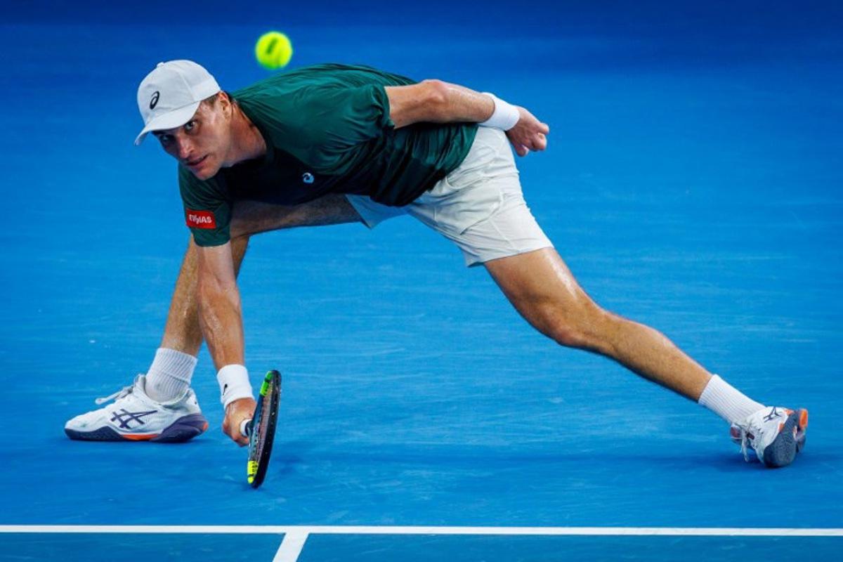 Belgium's Raphael Collignon hits a shot against USA's Brandon Nakashima during their men's singles match at the Brisbane International tennis tournament in Brisbane on January 9, 2026. Patrick HAMILTON / AFP