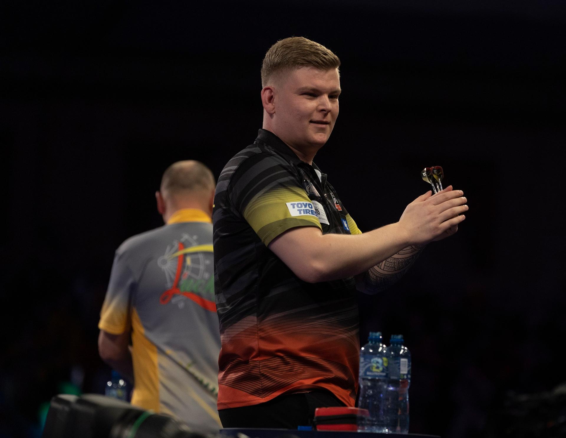 ATTENTION EDITORS - HAND OUT PICTURES - EDITORIAL USE WITH STORY ON DARTS WORLD CHAMPIONSHIPS ONLY - MANDATORY CREDIT LAWRENCE LUSTIG/PDC Hand out pictures released on Saturday 18 December 2021, by PDC Professional Darts Corporation shows Belgian Mike De Decker pictured during the game between Lithuanian Labanauskas and Belgian De Decker, in the first round of the William Hill World Championships, in London, UK. MANDATORY CREDIT KELLY DECKERS/PDC EUROPE