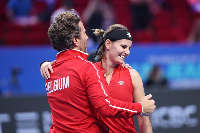 Belgian team captain Wim Fissette and Belgian Greet Minnen celebrate as they won a tennis match between Ukrainian Svitolina and Belgian Minnnen, the second rubber in the tie between Belgium and Ukraine in the Quarter Finals of the Billie King Cup tournament, on Thursday 24 September 2026 in Shenzhen, China. BELGA PHOTO VIRGINIE LEFOUR