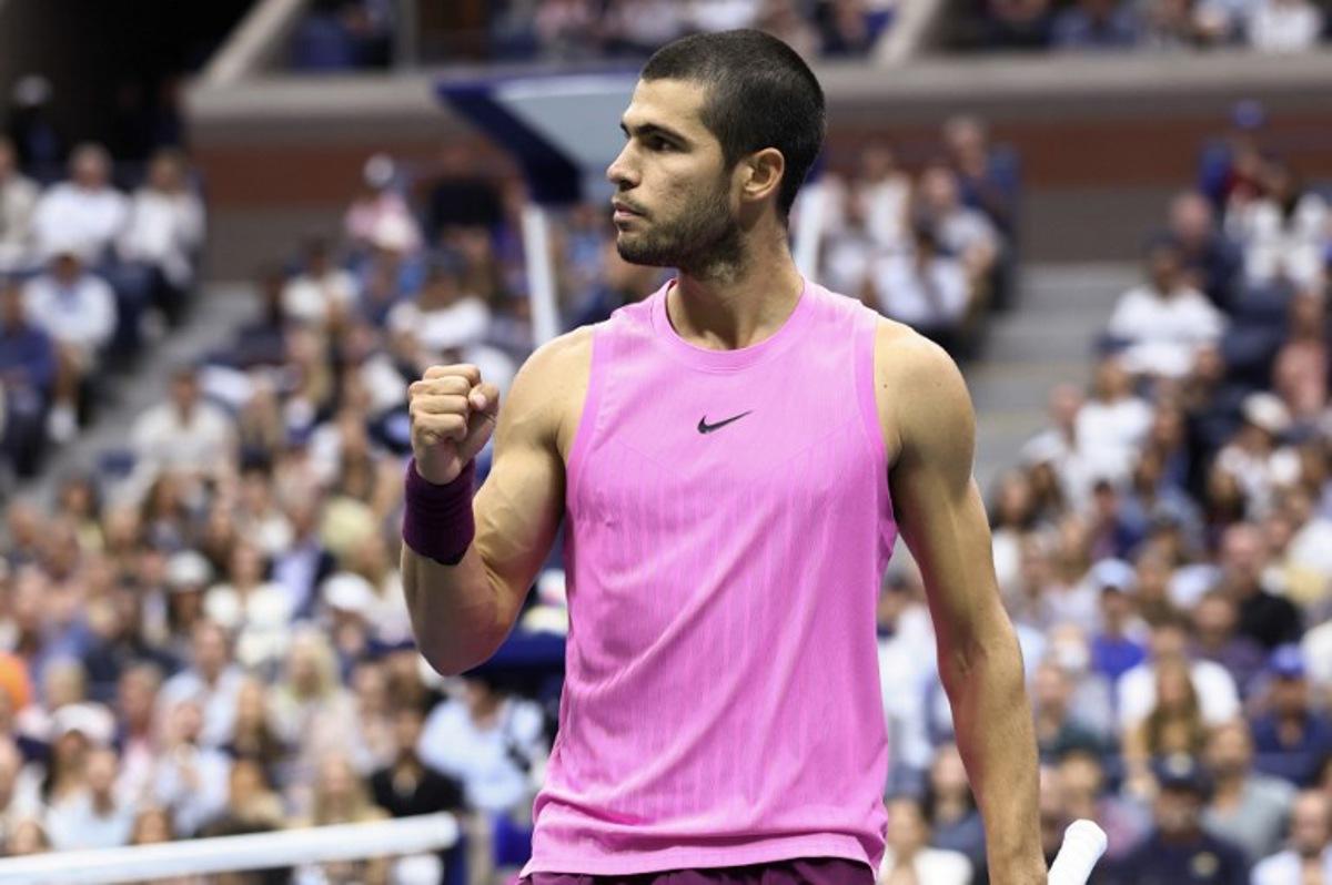Spain's Carlos Alcaraz celebrates after a point against Italy's Jannik Sinner during the men's singles final tennis match on day fifteen of the US Open tennis tournament at the USTA Billie Jean King National Tennis Center in New York City on September 7, 2025. CHARLY TRIBALLEAU / AFP
