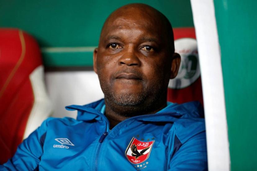 Ahly's South African coach Pitso Mosimane looks on during the CAF Champions League Semi-Final between Algeria's ES Setif and Egypt's al-Ahly at the 5 July stadium in the Algiers suburb of Ben Aknoun on May 14, 2022. AFP