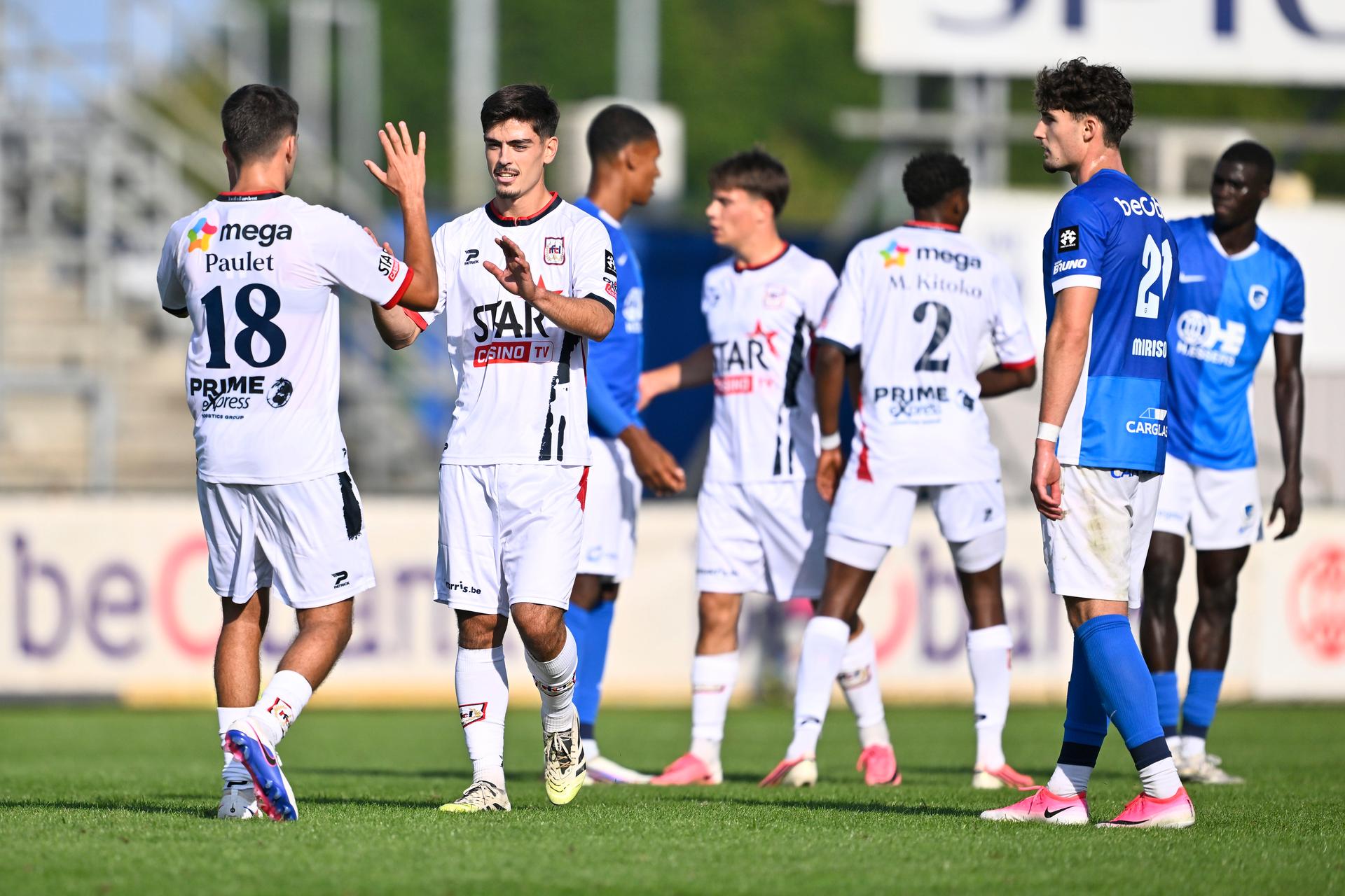 Liege's Simon Paulet and Liege's Kevin Shkurti celebrate after winning a soccer match between Jong Genk and RFC Liege, Sunday 23 August 2026 in Genk, on day 2 of the 2026-2027 'Challenger Pro League' 1B second division of the Belgian championship. BELGA PHOTO JOHAN EYCKENS