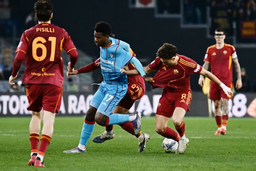 Roma's French midfielder #08 Neil El Aynaoui (R) and Cagliari's French forward #37 Yael Fritz Junior Trepy fight for the ball during the Italian Serie A football match between AS Roma and Cagliari at the Olympic Stadium in Rome on Febuary 9, 2026. Filippo MONTEFORTE / AFP
