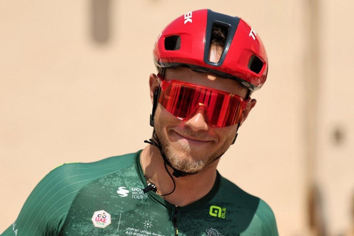 Lidl-Trek's Italian rider Jonathan Milan looks on before the sixth stage of the UAE Tour cycling event from al-Ain Museum to Jebel Hafeet in Abu Dhabi on February 21, 2026. Fadel SENNA / AFP