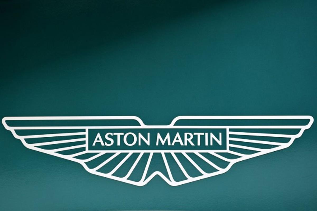 The logo for the Formula One Aston Martin Team pictured at the Autodromo Internazionale Enzo e Dino Ferrari race track in Imola, Italy, on April 23, 2022, ahead of the Formula One Emilia Romagna Grand Prix. MIGUEL MEDINA / AFP