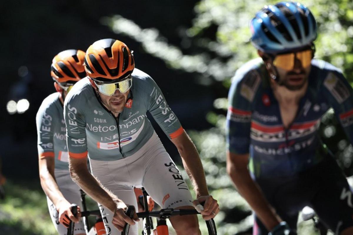 Netcompany Ineos Cycling Team's Belgian rider Laurens De Plus cycles during the 8th and final stage of the Tour Auvergne-Rhone-Alpes cycling race (formerly known as the Criterium du Dauphine), 120,1km between Beaufort and Plateau de Solaison, in the French Alps on June 14, 2026. Anne-Christine POUJOULAT / AFP