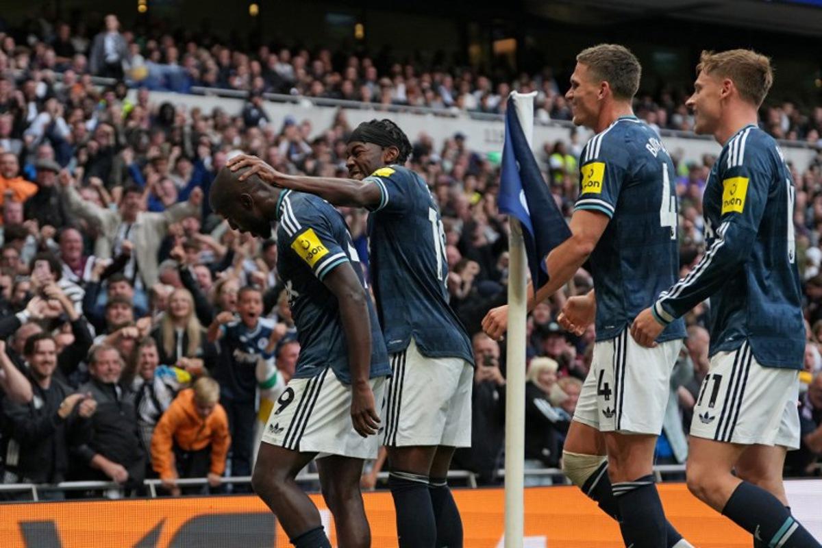 Newcastle United's Congolese striker #09 Yoane Wissa (L) celebrates with teammates after scoring their second goal during the English Premier League football match between Tottenham Hotspur and Newcastle United at the Tottenham Hotspur Stadium in London, on August 29, 2026. CARLOS JASSO / AFP