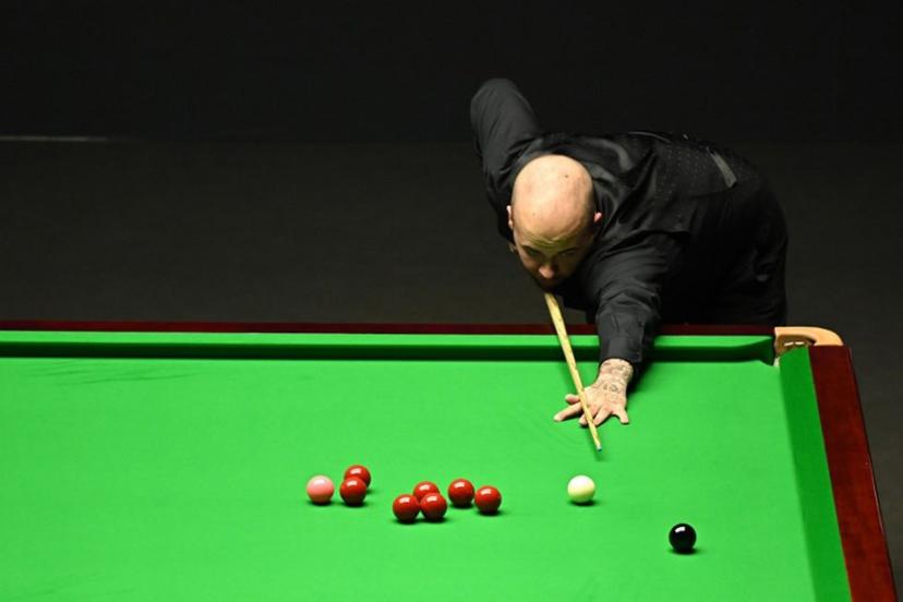 Belgium's Luca Brecel plays a shot against England's Mark Selby during the evening session on day two of their World Championship Snooker final match at The Crucible in Sheffield, northern England on May 1, 2023. Oli SCARFF / AFP