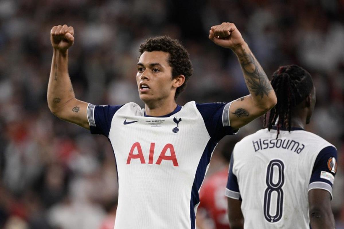 Tottenham Hotspur's Welsh forward #22 Brennan Johnson celebrates scoring the opening goal during the UEFA Europa League final football match between Tottenham Hotspur and Manchester United at San Mames stadium in Bilbao on May 21, 2025. Josep LAGO / AFP
