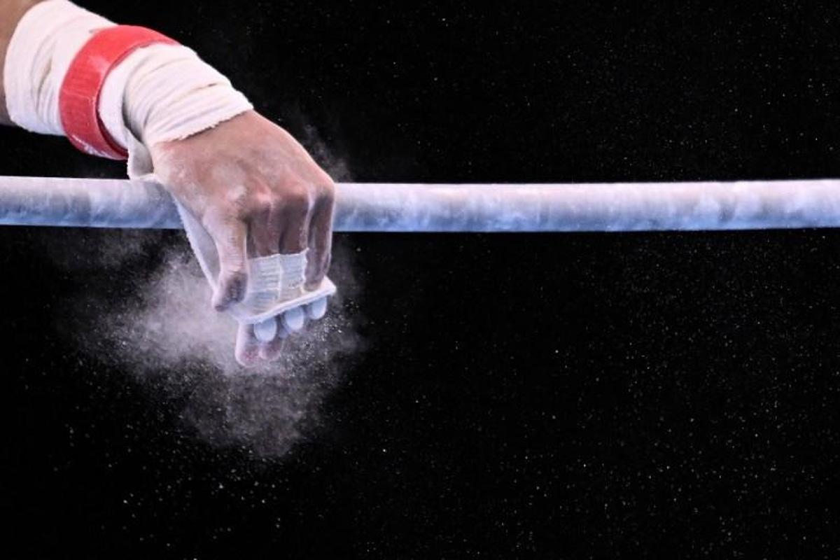 Chinese Taipei's Chih Kai Lee competes in the horizontal bar event of the artistic gymnastics men's all-around final during the Tokyo 2020 Olympic Games at the Ariake Gymnastics Centre in Tokyo on July 28, 2021. Lionel BONAVENTURE / AFP