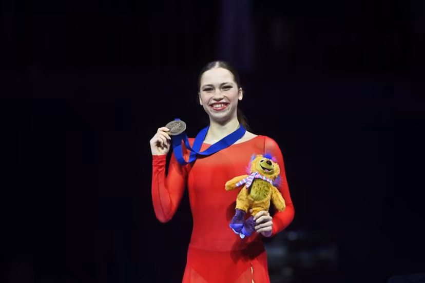 Bronze-medal winner Belgium's Nina Pinzarrone celebrates after winning the women's free skating program of the 2026 ISU Figure Skating World Championships in Prague, Czech Republic on March 27, 2026. Michal Cizek / AFP