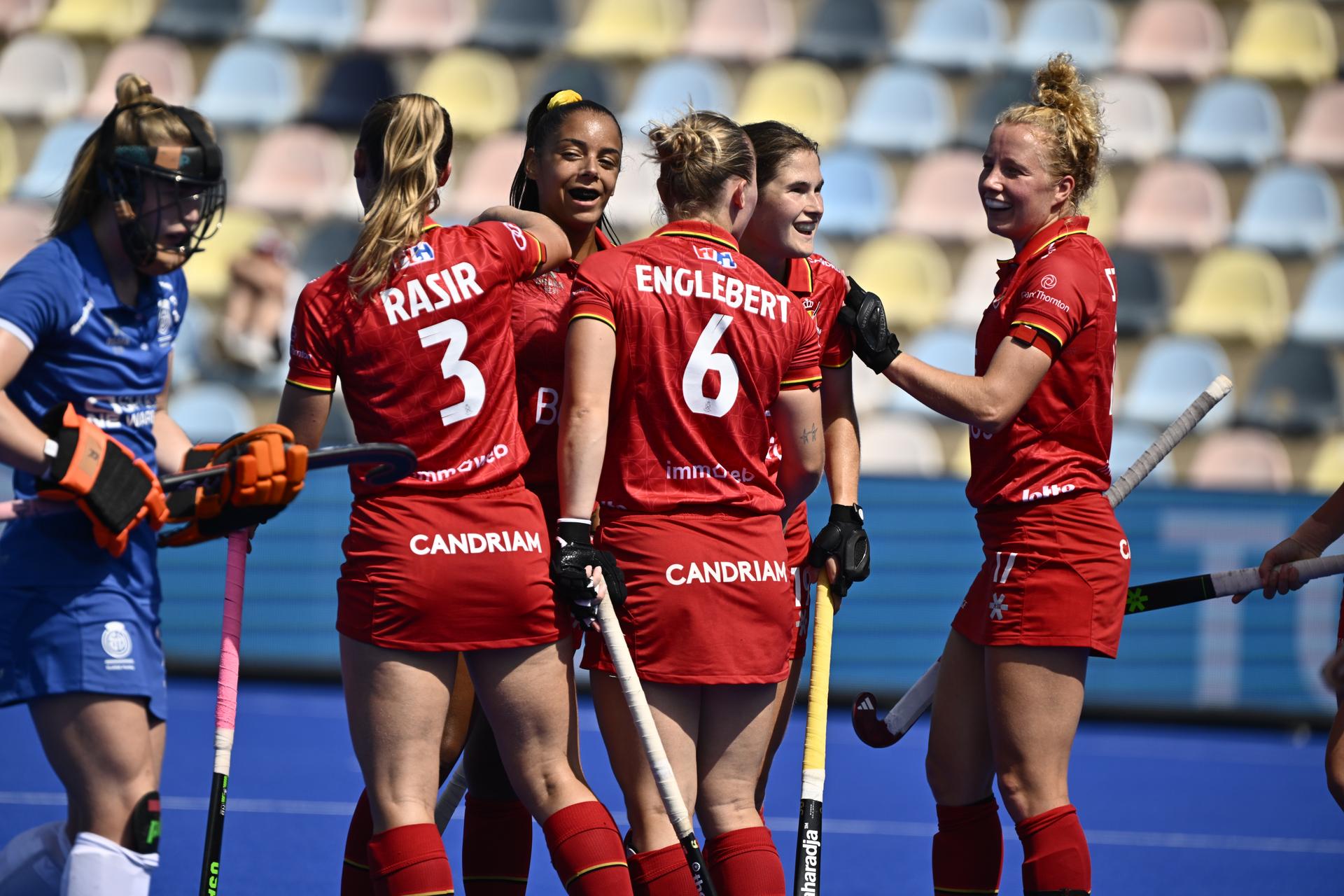Belgium's Ambre Ballenghien celebrates with Belgium's Justine Rasir and Belgium's Charlotte Englebert at a hockey game between Scotland and the Belgian national team Red Panthers, match 3/3 in the pool stage of the 2025 women's European championships, Wednesday 13 August 2025 in Monchengladbach, Germany. BELGA PHOTO ERIC LALMAND