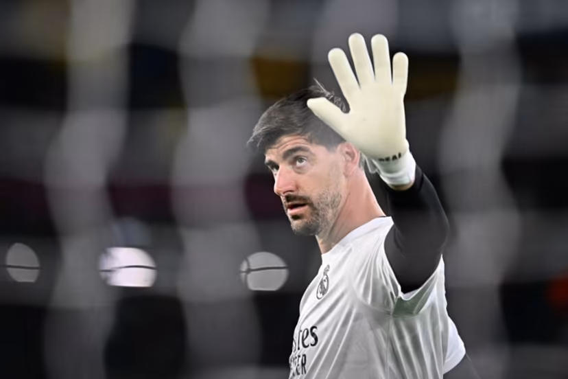 Real Madrid's Belgian goalkeeper #01 Thibaut Courtois warms up before the UEFA Champions Leaugue - 1st round day 2 football match between AS Roma and Real Madrid at the Olympic Stadium in Rome on October 14, 2026. Filippo MONTEFORTE / AFP