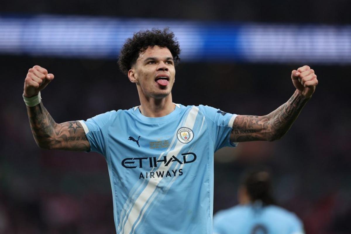 Manchester City's English midfielder #33 Nico O'Reilly celebrates scoring their second goal during the English League Cup final football match between Arsenal and Manchester City at Wembley Stadium in London on March 22, 2026. Adrian Dennis / AFP