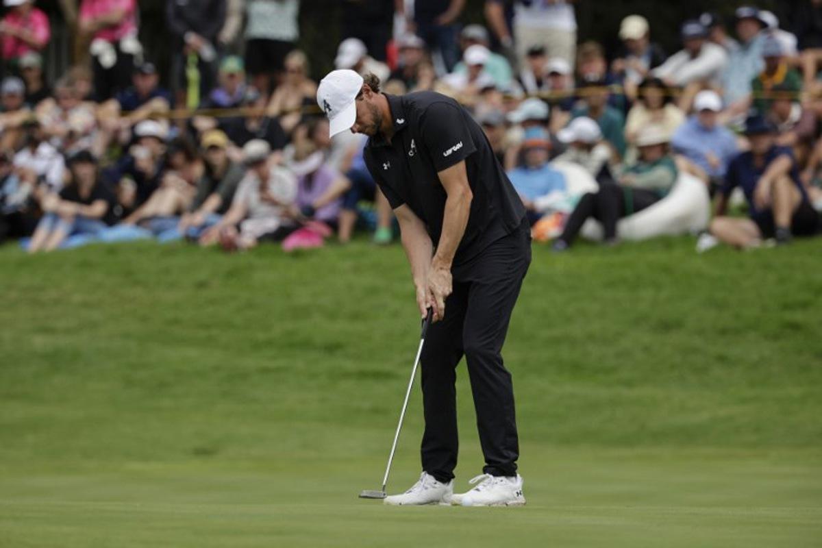 4Aces GC's Belgian player Thomas Pieters holes a putt on the 16th green of the fourth day of the LIV Golf South Africa tournament at The Club in Steyn City on March 22, 2026. WIKUS DE WET / AFP