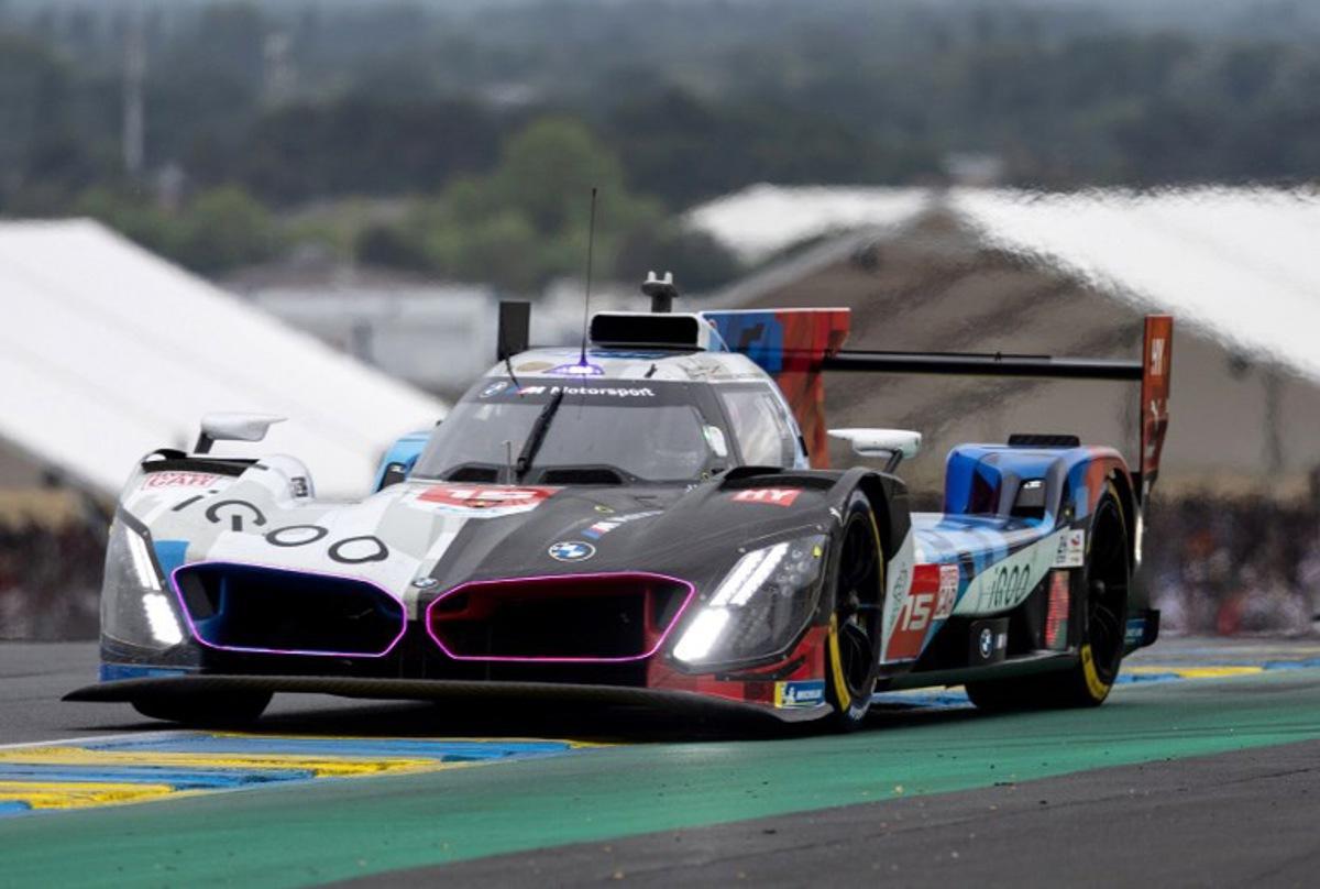 BMW M Team WRT's Belgian driver #15 Dries Vanthoor steers his hypercar during the 2025 Le Mans 24 hour endurance race, at the Le Mans circuit, in north-western France on June 14, 2025. Fred TANNEAU / AFP