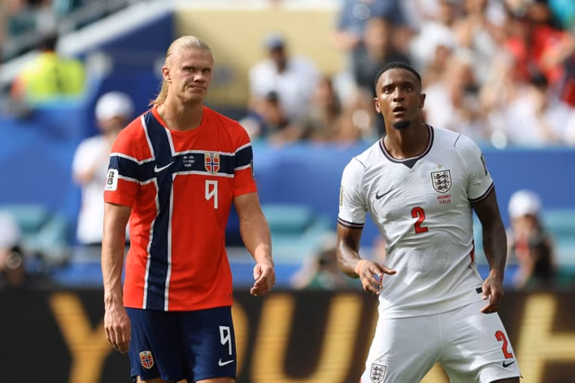 Norway's forward #09 Erling Braut Haaland reacts next to England's defender #02 Ezri Konsa during the 2026 World Cup football tournament quarter-final match between Norway and England at Miami Stadium in Miami Gardens on July 11, 2026. PATRICIA DE MELO MOREIRA / AFP