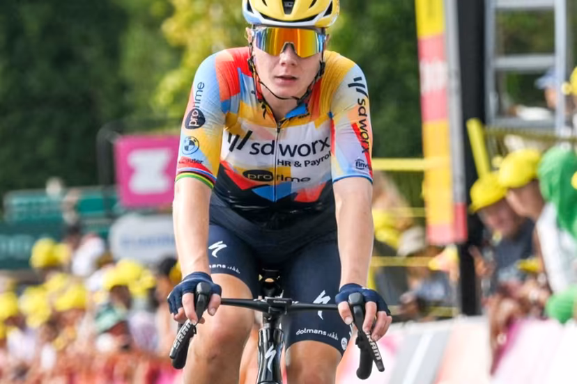 Team SD Worx-Protime's Belgian rider Lotte Kopecky crosses the finish line to finish in second-placed in the 3rd (out of 9) stage of the fifth edition of the Women's Tour de France cycling race, 156.5 km from Geneva to Poligny, in Poligny, central-eastern France on August 3, 2026. NICOLAS TUCAT / AFP