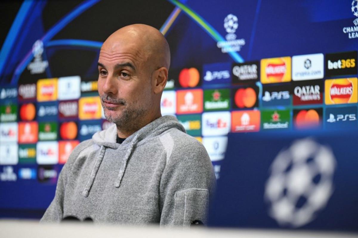 Manchester City's Spanish manager Pep Guardiola speaks during a press conference at the Etihad Stadium in Manchester, north-west England, on November 4, 2025, on the eve of their UEFA Champions League, league stage football match against Dortmund. Oli SCARFF / AFP