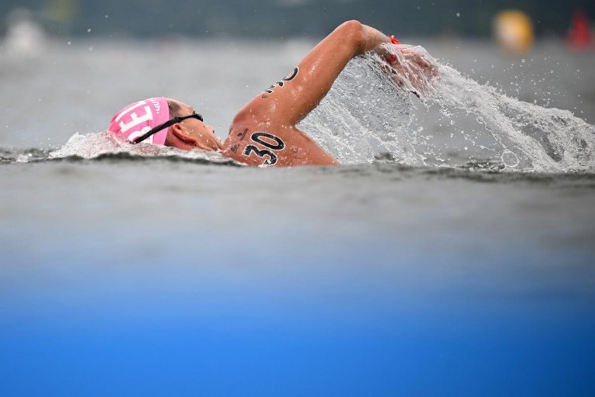 Belgium's Logan Vanhuys competes in the men's 5km open water swimming event during the World Aquatics Championships in Fukuoka on July 18, 2023. Philip FONG / AFP