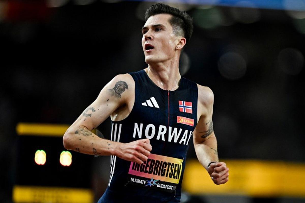 Norway's Jakob Ingebrigtsen celebrates his victory in the men's 5000m final during the World Athletics Ultimate Championship at the Gyula Zsivotzky National Athletics Centre, in Budapest on September 11, 2026. Jewel SAMAD / AFP