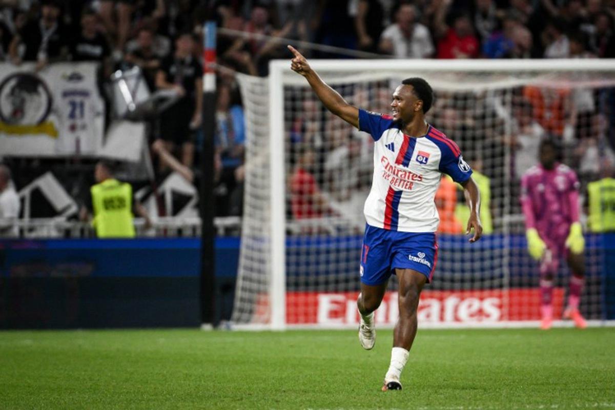 Lyon's Belgian forward #17 Lois Openda celebrates after scoring his team's first goal during the French L1 football match between Olympique Lyonnais (OL) and Le Havre AC (HAC) at the Groupama Stadium in Decines-Charpieu, central-eastern France on August 29, 2026. ARNAUD FINISTRE / AFP
