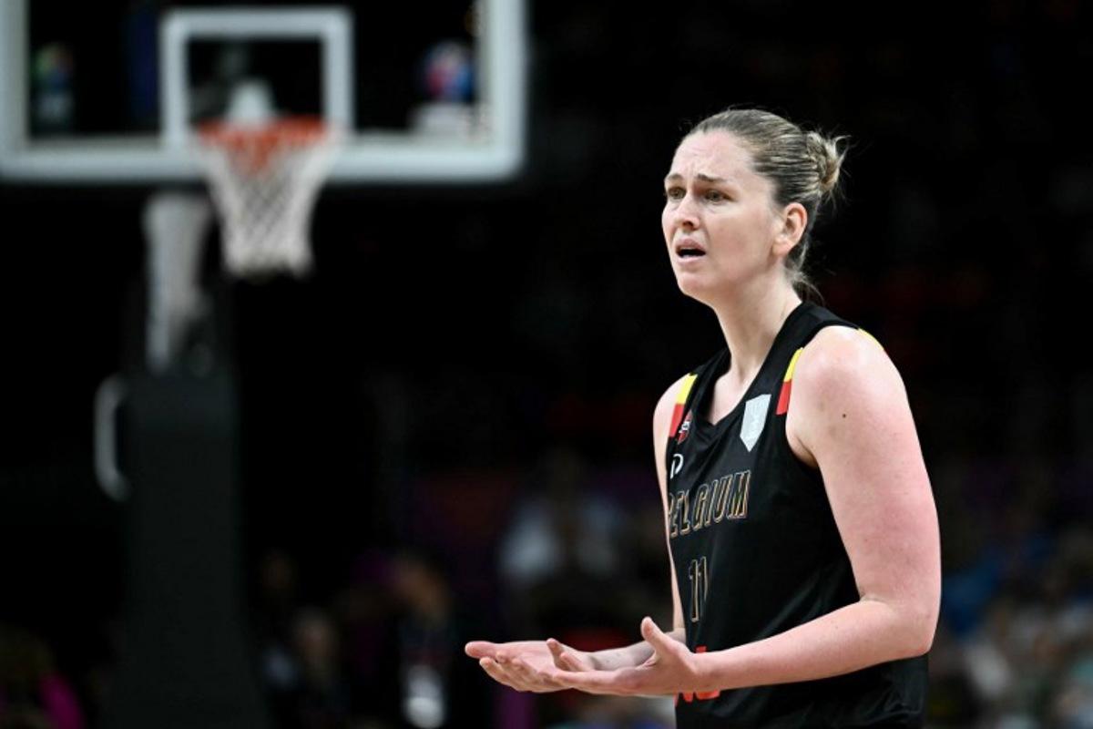 Belgium's power forward Emma Meesseman reacts on the floor during the FIBA Women's EuroBasket 2025 final match between Spain and Belgium at the Peace and Friendship Stadium in Athens on June 29, 2025. Aris MESSINIS / AFP