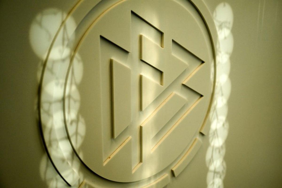 The logo of the German Football Association (DFB) is pictured on the sidelines of a training session of the German national football team on November 15, 2023 in Frankfurt am Main, western Germany, in preparation of the team's international friendly football match Germany v Turkey to take place on November 18, 2023. Kirill KUDRYAVTSEV / AFP