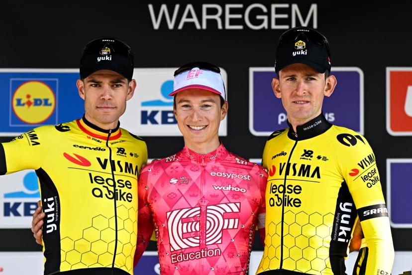 Belgian Wout van Aert of Team Visma-Lease a Bike, American Neilson Powless of EF Education-EasyPost and Belgian Tiesj Benoot of Team Visma-Lease a Bike celebrate on the podium of the men elite race of the 'Dwars Door Vlaanderen' cycling event, 184,2km from Roeselare to Waregem, Wednesday 02 April 2025. BELGA PHOTO JASPER JACOBS