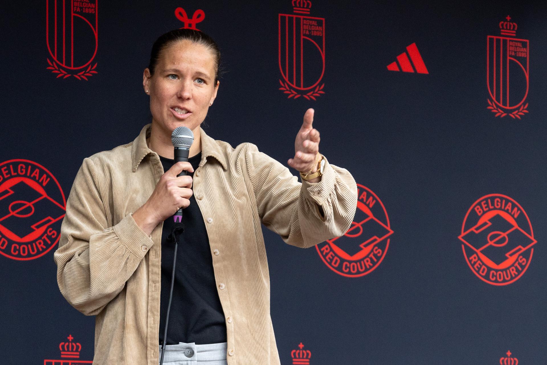 Red Flame Lenie Onzia delivers a speech at the opening of a 'Belgian Red Court' soccer field for youths in Borgerhout, Antwerp on Wednesday 09 October 2024. The Royal Belgian Football Association sponsors the opening of soccer courts in the whole country. BELGA PHOTO WARD VANDAEL