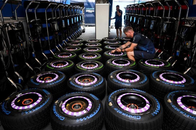 A technician checks tires at the Spa-Francorchamps circuit, in Spa, ahead of the Formula One Belgian Grand Prix, on July 16, 2026. JOHN THYS / AFP