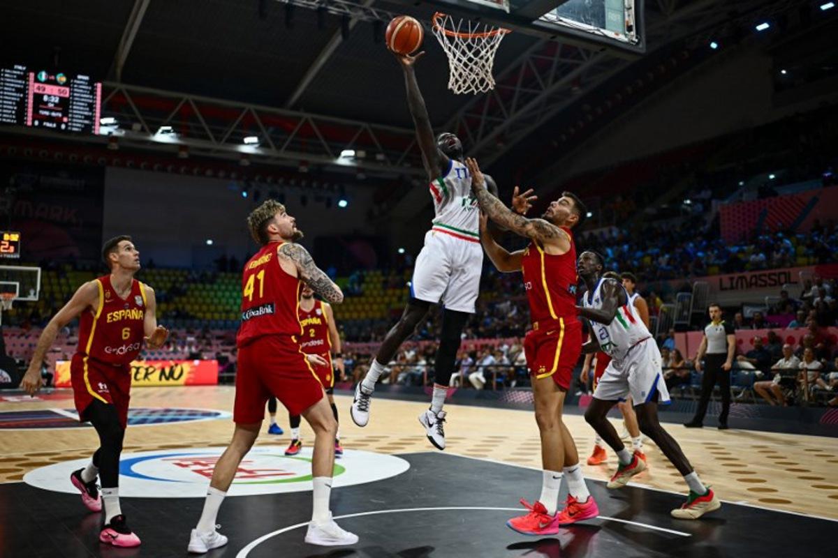Italy's centre #35 Mouhamet Diouf scores during the FIBA EuroBasket 2025 basketball match between Italy and Spain at Spyros Kyprianou Arena in Limassol on September 2, 2025. Jewel SAMAD / AFP