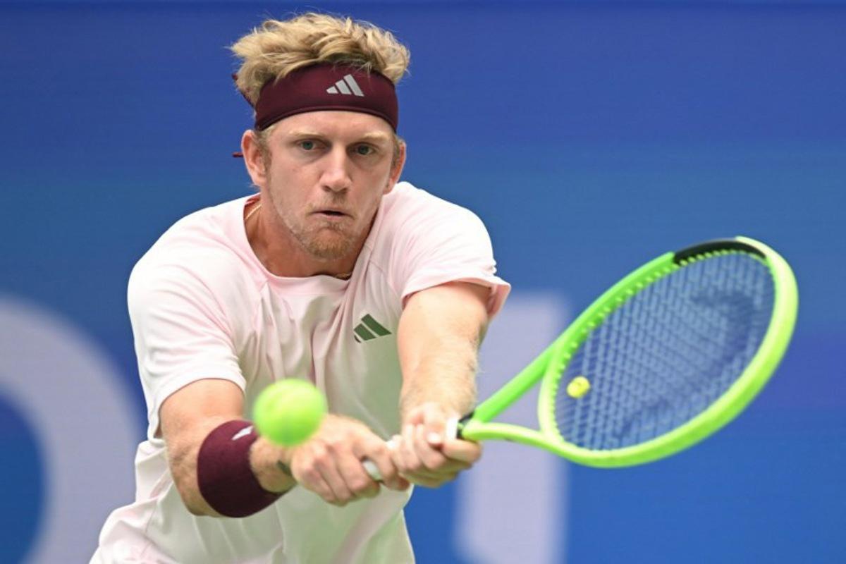 Spain's Alejandro Davidovich Fokia hits a return to France's Alexandre Muller during their men's singles quarter-final match at the Chengdu Open tennis tournament in Chengdu, in China's southwest Sichuan province on September 27, 2026. STR / AFP