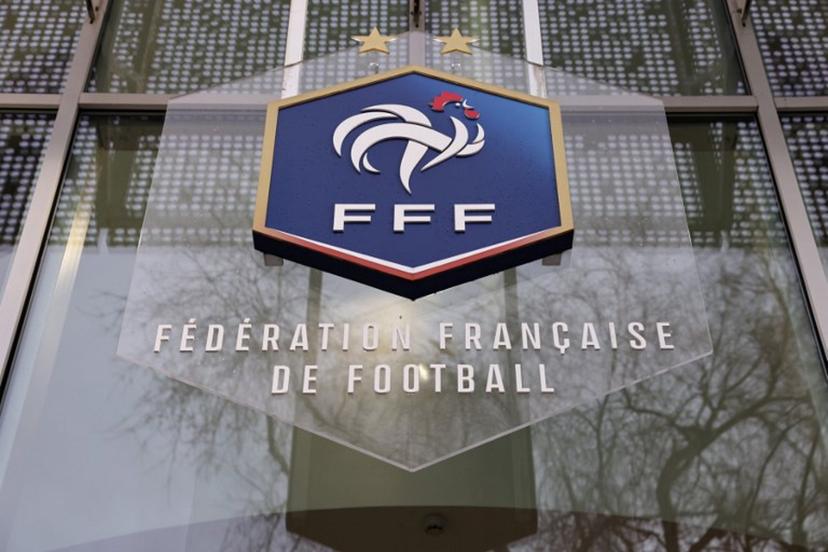 A picture taken on January 11, 2023 shows the logo of the French Football Federation (FFF) on the facade of its headquarters in Paris. Thomas SAMSON / AFP