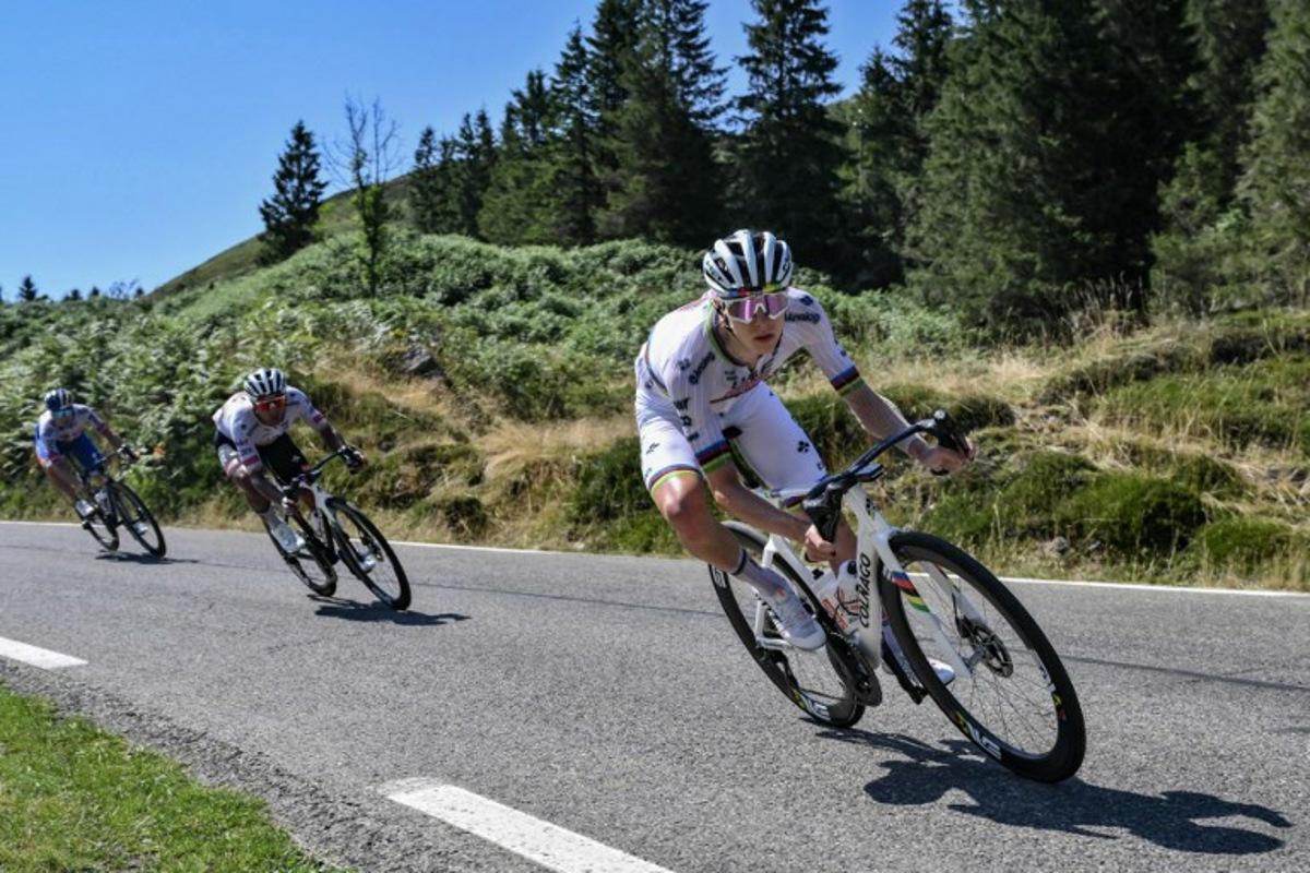 UAE Team Emirate - XRG team's Slovenian rider Tadej Pogacar cycles in the descent of Col du Soulor during the 12th stage of the 112th edition of the Tour de France cycling race, 180.6 km between Auch and Hautacam, in the Pyrenees mountains of southwestern France, on July 17, 2025. Marco BERTORELLO / AFP