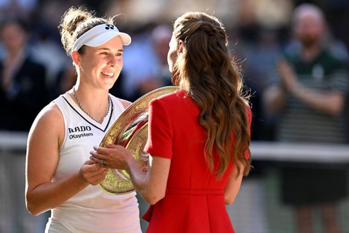 Britain's Catherine, Princess of Wales gives the winner's trophy, the Venus Rosewater Dish, to Czech Republic's Linda Noskova after her victory against Czech Republic's Karolina Muchova at the end of their women's singles final tennis match on the thirteenth day of the 2026 Wimbledon Championships at The All England Lawn Tennis and Croquet Club in Wimbledon, southwest London, on July 11, 2026. Kirill KUDRYAVTSEV / AFP