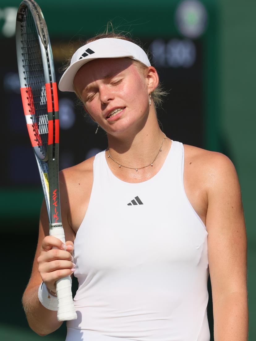 Belgian Jeline Vandromme reacts during a tennis match against Georgian Bolkvadze, a qualifier for the women's singles at the Wimbledon grand slam tennis tournament in London, Britain, Thursday 25 June 2026. The main tournament is starting next Monday. BELGA PHOTO BENOIT DOPPAGNE
