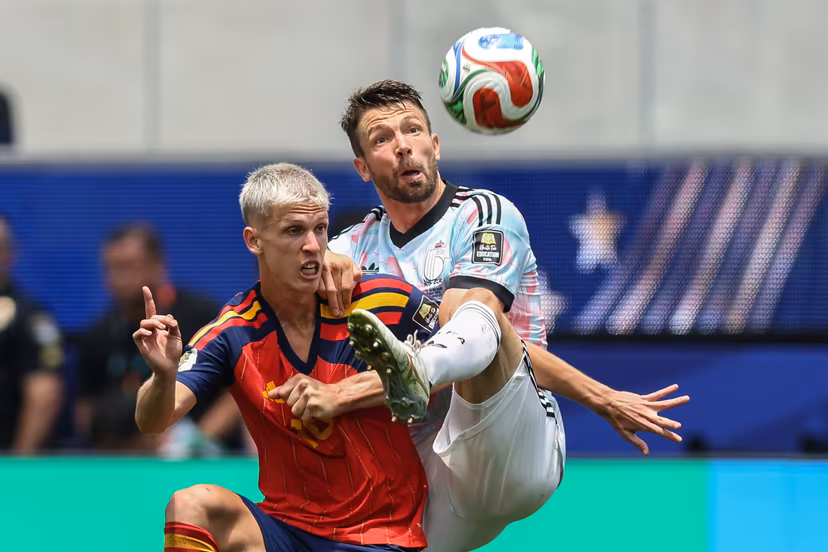 Spain's Dani Olmo and Belgium's Brandon Mechele fight for the ball during a soccer game between Spain and Belgian national team Red Devils, on Friday 10 July 2026 in Los Angeles, USA, in the 1/4 finals of the FIFA World Cup 2026. BELGA PHOTO BRUNO FAHY