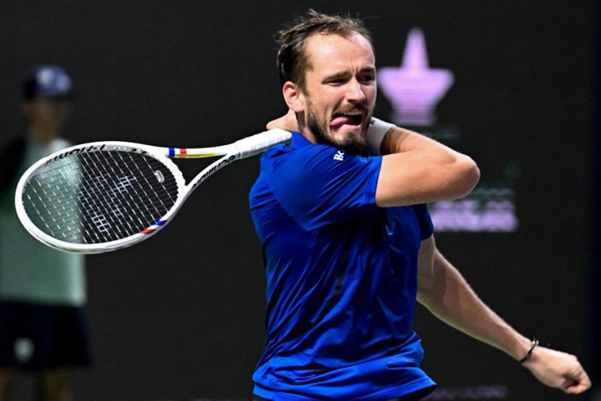 Russia's Daniil Medvedev hits a return to Czech Republic's Dalibor Svrcina during their men's singles match at the Shanghai Masters tennis tournament in Shanghai on October 12, 2026. CN-STR / AFP