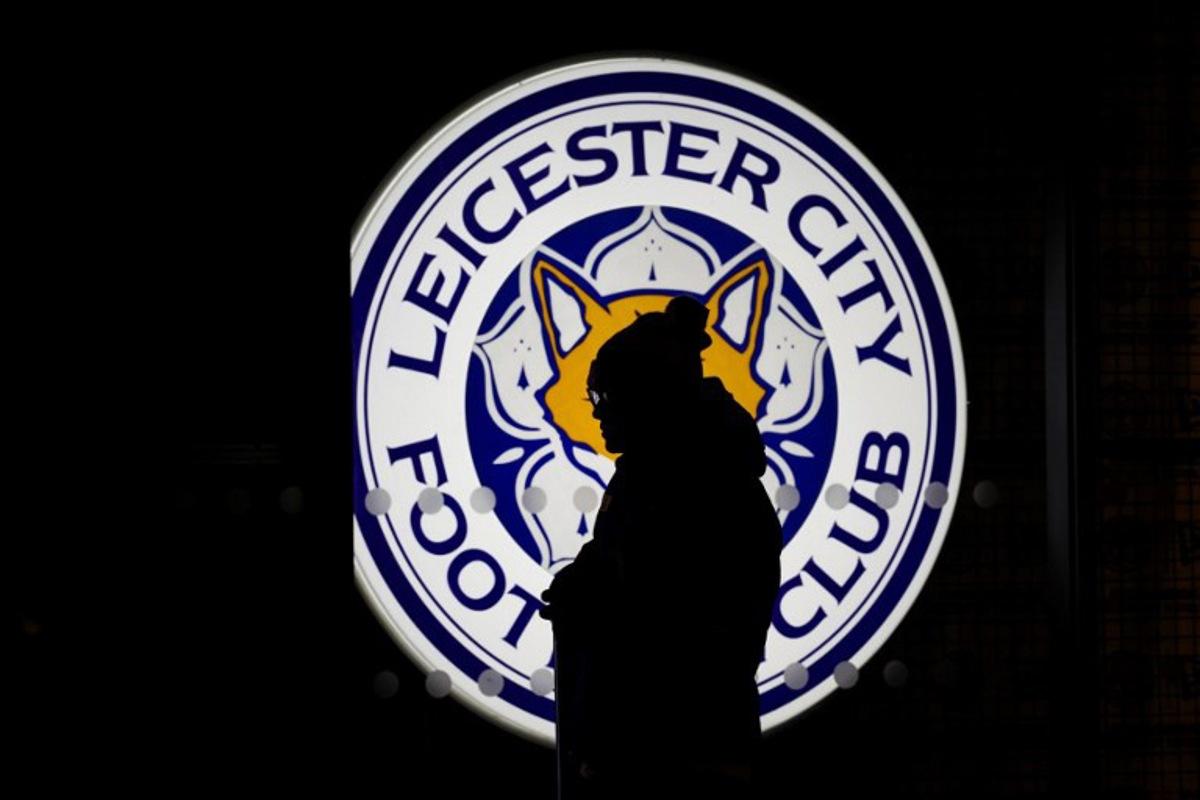 A supporter arrives at King Power Stadium in Leicester, central England prior to the English Premier League football match between Leicester City and Brentford, on February 21, 2025. Darren Staples / AFP