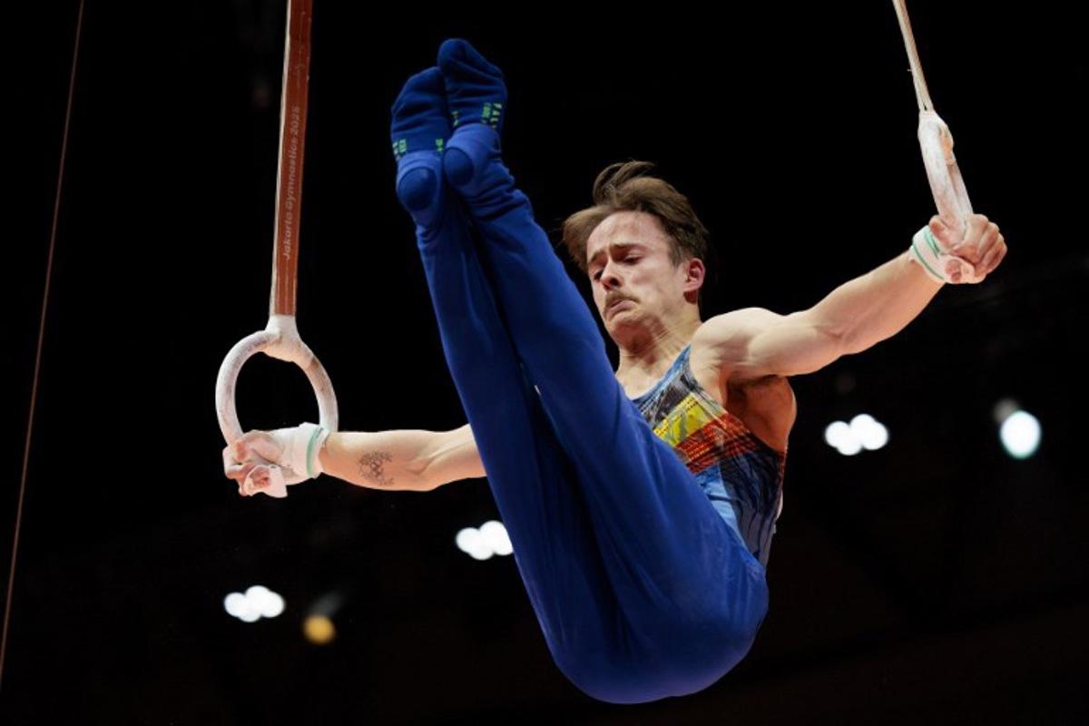 Belgium's Glen Cuyle competes during the men's rings final at the 53rd FIG Artistic Gymnastics World Championships in Jakarta on October 24, 2025. Yasuyoshi CHIBA / AFP