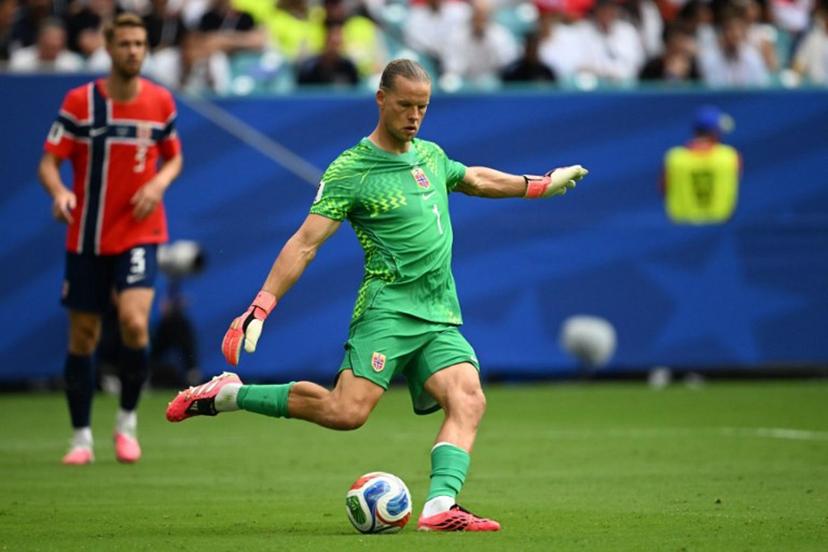 Norway's goalkeeper #01 Orjan Nyland kicks the ball during the 2026 World Cup football tournament quarter-final match between Norway and England at Miami Stadium in Miami Gardens on July 11, 2026. MAURO PIMENTEL / AFP
