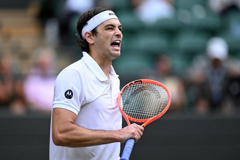 US player Taylor Fritz celebrates winning against Kazakhstan's Alexander Bublik during their men's singles round of 16 tennis match on the eighth day of the 2026 Wimbledon Championships at The All England Lawn Tennis and Croquet Club in Wimbledon, southwest London, on July 6, 2026. Kirill KUDRYAVTSEV / AFP