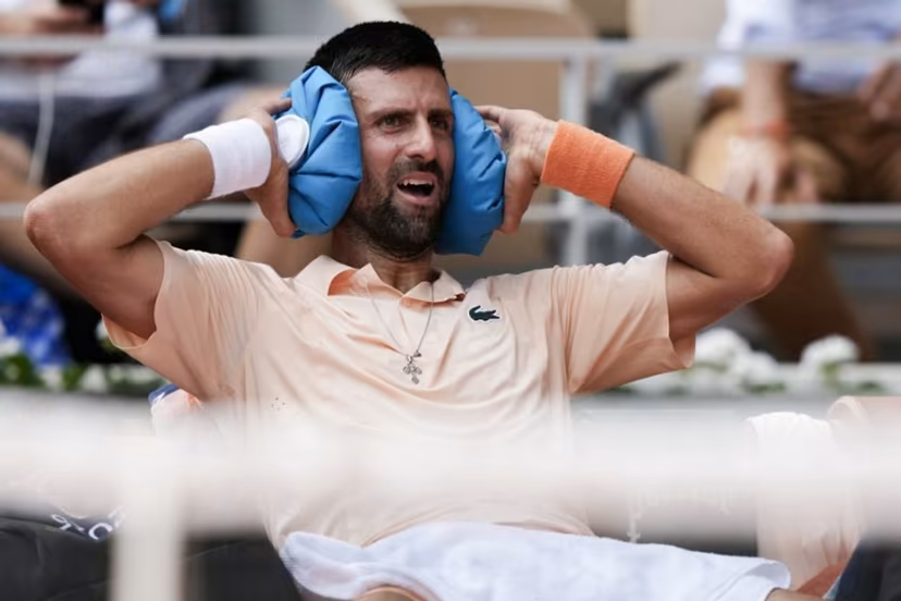 Serbia's Novak Djokovic reacts while sitting in between games as he plays against Brazil's Joao Fonseca during their men's singles match on day 6 of the French Open tennis tournament on Court Philippe-Chatrier at the Roland-Garros Complex in Paris on May 29, 2026. Dimitar DILKOFF / AFP
