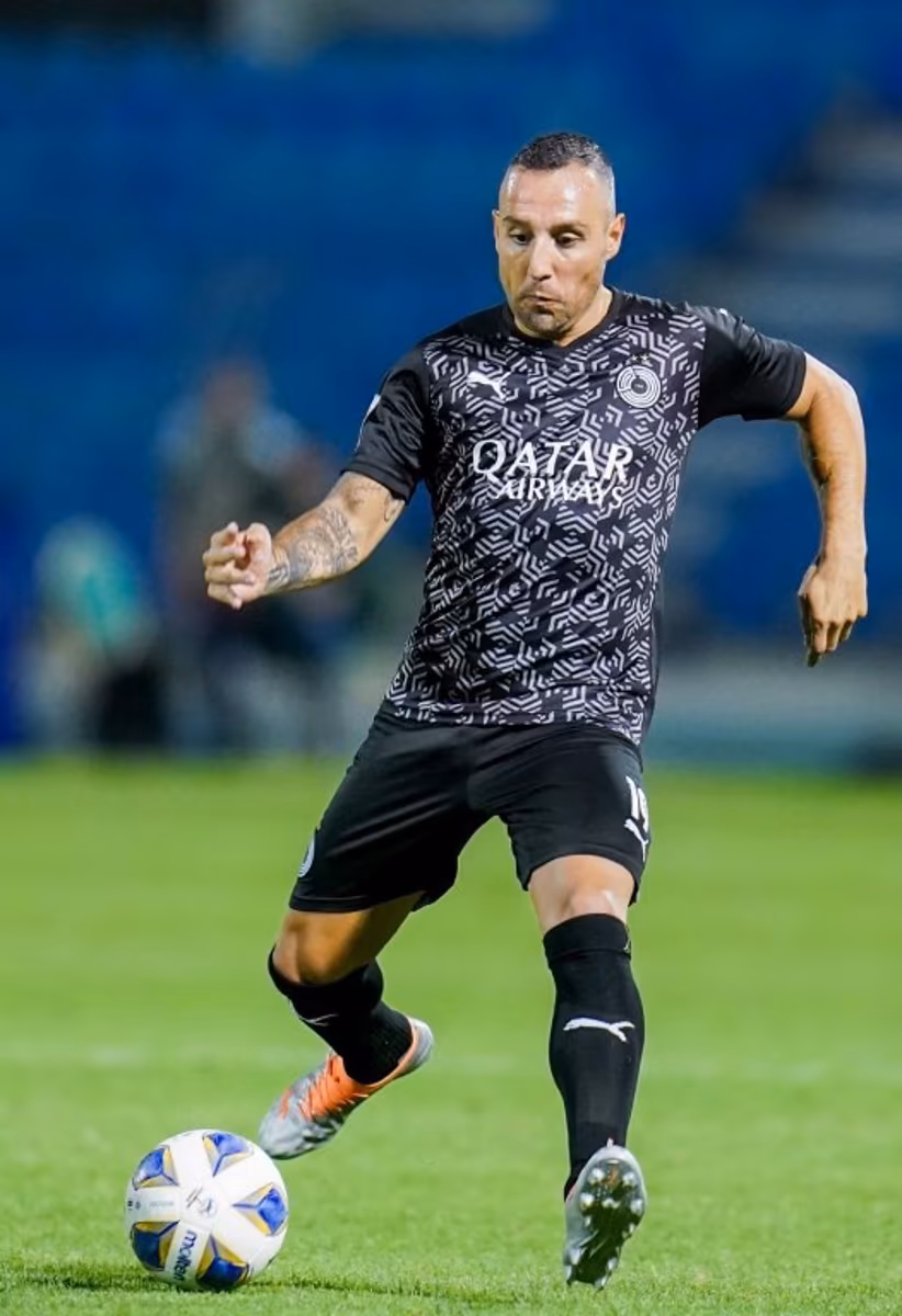 Sadd's midfielder Santi Cazorla runs with the ball during the AFC Champions League group E match between Qatar's al-Sadd and Jordan's al-Wehdat at Prince Mohamed bin Fahd Stadium in Saudi Arabia's Dammam on April 15, 2022. Yousef DOUBISI / AFP