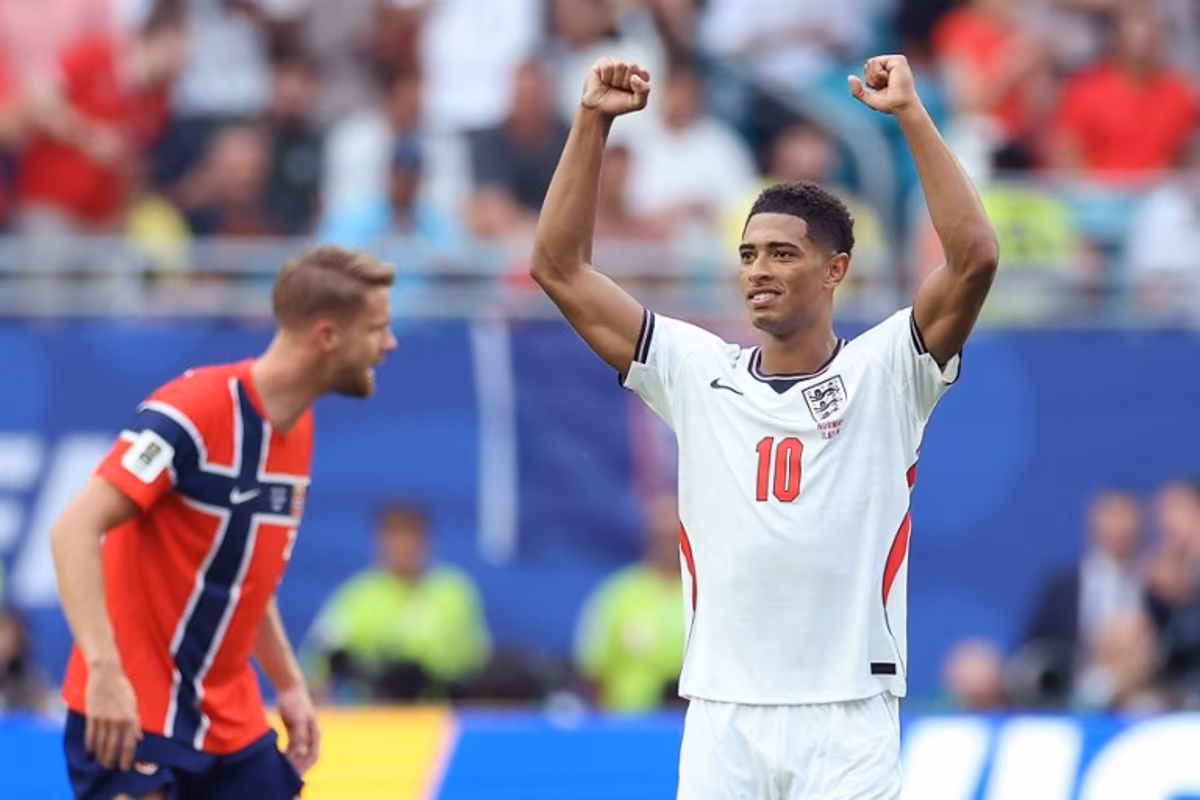 England's midfielder #10 Jude Bellingham celebrates after scoring his second goal during the first half of the extra-time of the 2026 World Cup football tournament quarter-final match between Norway and England at Miami Stadium in Miami Gardens on July 11, 2026. PATRICIA DE MELO MOREIRA / AFP