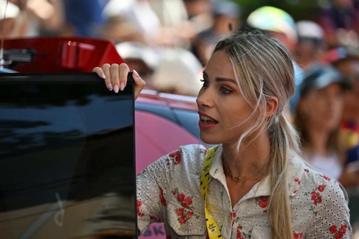 Director of the race Marion Rousse reacts prior to the start of the first (out of 9) stage of the fifth edition of the Women's Tour de France cycling race, 138 km from Lausanne to Lausanne on August 1, 2026. Nicolas TUCAT / AFP